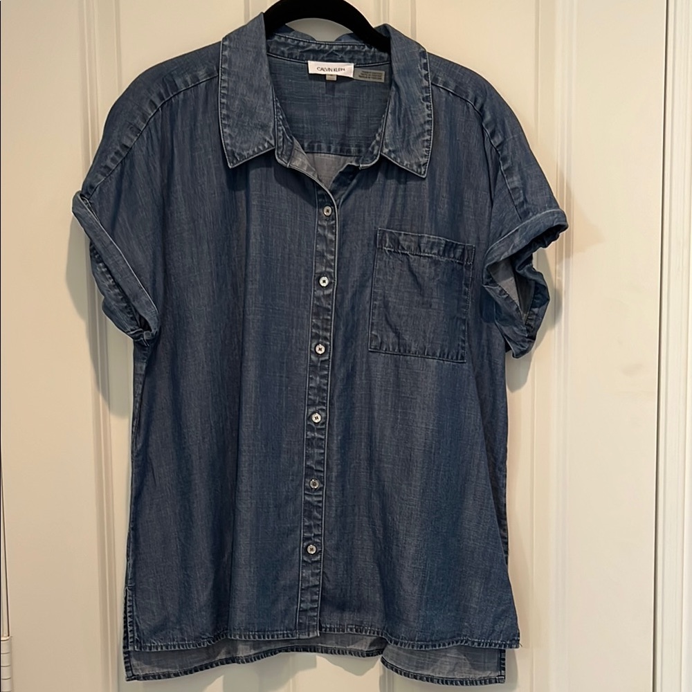 Shirt.Clavin Klein,button front with one pocket.Made from Lyocell